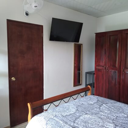 Bedroom: queen-size bed, remote controlled fan, web-tv (Android/WiFi), mirror,  wardrobe